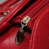 Небольшая дамская сумочка темно-красного цвета